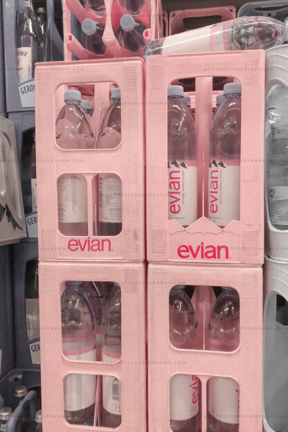 Aesthetic image of pile of Evian water bottle pink crates