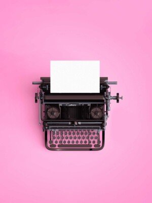 free pink aesthetic typewriter background image
